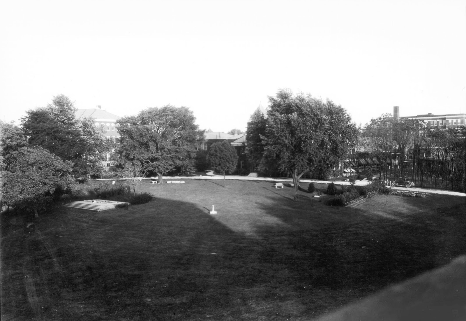 About 25 feet of the original track was to be set on a concrete base on the campus of the university, in front of Mechanical Hall (razed in 1964 to make room for the F. Paul Anderson Tower). Here the memorial sits to the left with Mechanical Hall in the center and the Science (now Miller) Building on the right. Photo courtesy of UK Special Collections.